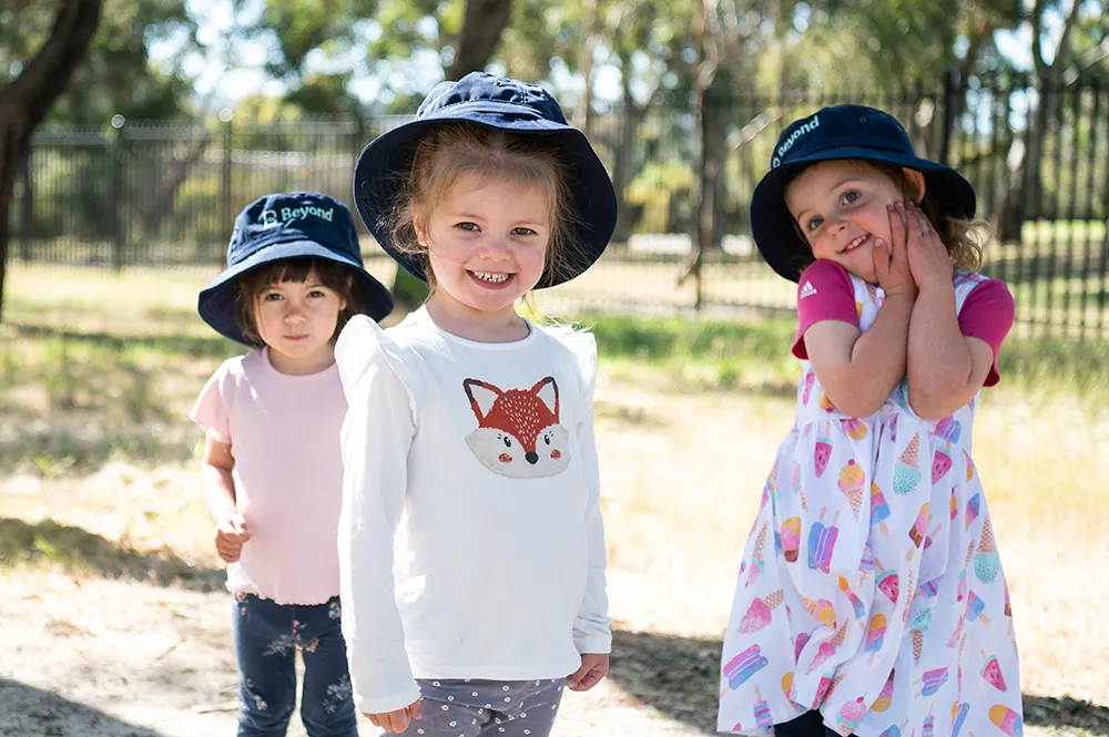 Happy children learning outdoors.